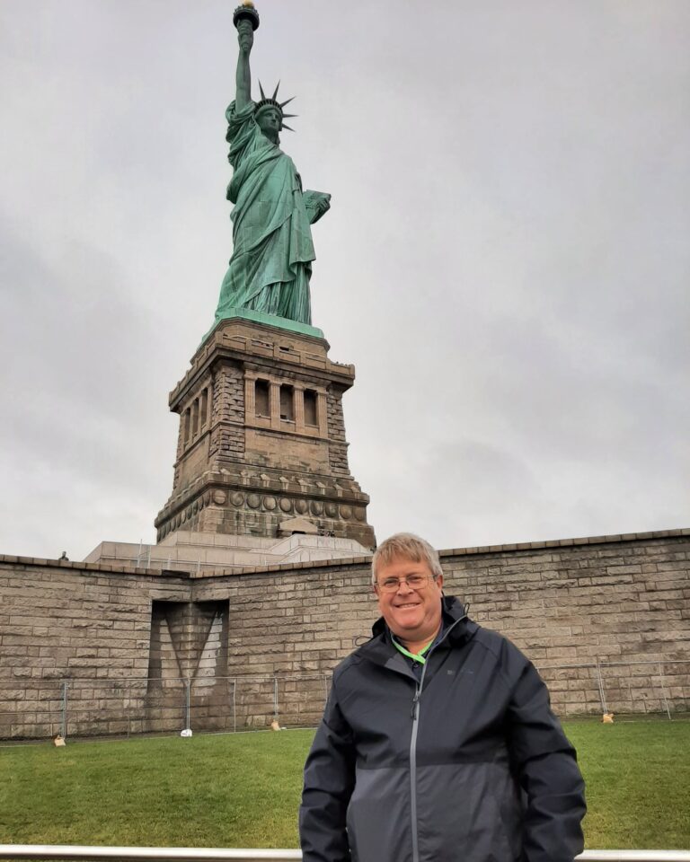 Ken near the base of the Statue of Liberty