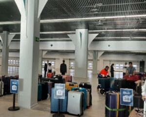 Collecting luggage from the baggage hall